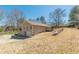 Exterior with fenced yard, deck, and a convenient garage on a well-maintained lawn at 537 Pine Shadows Dr, Dallas, GA 30157