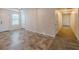 Hallway with multiple doors, carpeted floor and view of entryway doors at 537 Pine Shadows Dr, Dallas, GA 30157