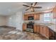 Well-lit kitchen with stainless steel appliances and ample counter space at 537 Pine Shadows Dr, Dallas, GA 30157