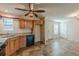 Kitchen view with wooden cabinets, stainless steel appliances, and granite countertops at 537 Pine Shadows Dr, Dallas, GA 30157