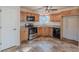 Functional kitchen with stainless steel appliances and wood cabinetry at 537 Pine Shadows Dr, Dallas, GA 30157