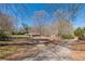 A lovely home surrounded by trees and yard at 537 Pine Shadows Dr, Dallas, GA 30157