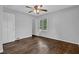 Bedroom with wood floors, neutral paint, and a ceiling fan at 2261 Headland Ter, Atlanta, GA 30344