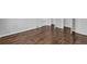 Bedroom with wood floors, wainscotting, and bright white trim at 2261 Headland Ter, Atlanta, GA 30344
