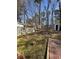Fenced backyard with a shed and plenty of space for outdoor activities and relaxation at 2295 Golden Valley Dr, Lawrenceville, GA 30043