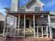 View of screen-in porch with ceiling fan; the structure is attached to a large vinyl-sided house at 2295 Golden Valley Dr, Lawrenceville, GA 30043
