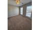 Bedroom featuring a ceiling fan and double-hung windows providing plenty of natural light at 2295 Golden Valley Dr, Lawrenceville, GA 30043
