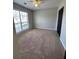 Bedroom featuring a ceiling fan and a double-hung window providing natural light at 2295 Golden Valley Dr, Lawrenceville, GA 30043