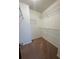 Walk-in closet with carpeted floors and shelving for organization at 2295 Golden Valley Dr, Lawrenceville, GA 30043