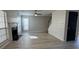 Spacious living room with wood floors, fireplace, ceiling fan and shiplap accent wall at 2295 Golden Valley Dr, Lawrenceville, GA 30043