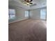 Large main bedroom with neutral walls, carpet floors, and trey ceiling at 2295 Golden Valley Dr, Lawrenceville, GA 30043
