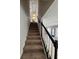 Carpeted staircase leading to the second floor at 2295 Golden Valley Dr, Lawrenceville, GA 30043