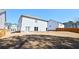 Backyard with a patio, the rear of the home, and wooden fencing for privacy at 3557 Bryant Meadow Cir, Buford, GA 30519