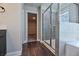 Bright bathroom with a glass-enclosed shower and vanity at 3557 Bryant Meadow Cir, Buford, GA 30519