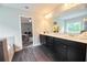 Beautiful bathroom with double vanity, tub, and access to the main bedroom at 3557 Bryant Meadow Cir, Buford, GA 30519