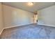 Large carpeted bedroom with ample space and light, ready for personalization at 3557 Bryant Meadow Cir, Buford, GA 30519
