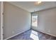 Cozy bedroom with soft carpet, natural light from the window, and neutral paint at 3557 Bryant Meadow Cir, Buford, GA 30519