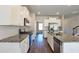 Modern kitchen featuring granite countertops, stainless steel appliances, and ample storage at 3557 Bryant Meadow Cir, Buford, GA 30519