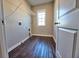 Functional laundry room with shelving, offering convenience and organization at 3557 Bryant Meadow Cir, Buford, GA 30519
