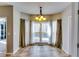 Bright breakfast nook with tile floors, and access to the outdoor deck through sliding glass doors at 6921 Springbank Way, Stone Mountain, GA 30087
