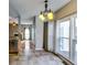 Sunlit breakfast nook with tile floors and sliding glass doors leading to the outdoor space at 6921 Springbank Way, Stone Mountain, GA 30087