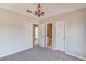 Bedroom featuring carpeted floors and doorways leading to an en-suite bathroom at 1674 Summersweet Ln, Dacula, GA 30019