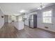 Open-concept kitchen featuring stainless steel appliances and a functional island at 2609 Colonial Dr, Atlanta, GA 30337