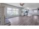 Open living room concept with fireplace and direct access to the kitchen at 2609 Colonial Dr, Atlanta, GA 30337