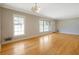 Open living space filled with natural light from large windows and hardwood floors at 2609 Colonial Dr, Atlanta, GA 30337