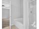 Bright bathroom features a separate shower and bathtub with tile surround at 5016 Larkspur Ln, Atlanta, GA 30349