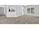 Open living space with view to breakfast nook, perfect for modern living at 5016 Larkspur Ln, Atlanta, GA 30349