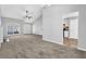 Inviting living room with high ceilings, fireplace, and open floor plan at 5016 Larkspur Ln, Atlanta, GA 30349