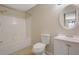 Bathroom features shower/tub combo and single sink vanity at 1124 Brandon Hill Way, Jonesboro, GA 30238