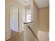 Second floor hallway with access to the bedrooms and bathroom at 1124 Brandon Hill Way, Jonesboro, GA 30238