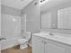 Clean bathroom with modern vanity and tub-shower combination at 2551 Tolliver Dr, Ellenwood, GA 30294