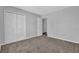 Bedroom with closets and access to another room at 2551 Tolliver Dr, Ellenwood, GA 30294