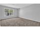 Well-lit bedroom with window view at 2551 Tolliver Dr, Ellenwood, GA 30294