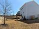 Backyard featuring a deck, a fenced yard, and partial landscaping at 3836 Saddle Hill Way, Douglasville, GA 30135