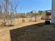 Large backyard with a privacy fence, landscaping, and plenty of space for outdoor activities at 3836 Saddle Hill Way, Douglasville, GA 30135