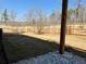 Backyard with a freshly installed wooden fence and freshly laid sod at 3836 Saddle Hill Way, Douglasville, GA 30135
