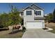 Charming two-story home with a well-maintained lawn and a two-car garage at 3836 Saddle Hill Way, Douglasville, GA 30135