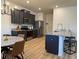 Modern kitchen featuring gray cabinets, stainless steel appliances, and a cozy breakfast nook at 3836 Saddle Hill Way, Douglasville, GA 30135