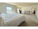 Bright main bedroom with large windows, a walk-in closet, and plenty of space for a home office at 3836 Saddle Hill Way, Douglasville, GA 30135