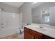 Bathroom featuring a white vanity, and shower-tub combo at 5027 Lower Elm St, Atlanta, GA 30349