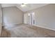 Spacious bedroom with neutral carpeting and paint and a ceiling fan at 5027 Lower Elm St, Atlanta, GA 30349
