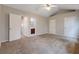 Large bedroom with neutral paint and carpet, featuring a ceiling fan at 5027 Lower Elm St, Atlanta, GA 30349