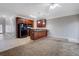 Open floor plan featuring a kitchen with brown cabinets at 5027 Lower Elm St, Atlanta, GA 30349