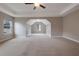 Large bedroom with tray ceiling and neutral carpet at 5414 Splendida Ct, Fairburn, GA 30213