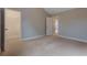 This bedroom has a walk in closet and an open door leading to another room at 5414 Splendida Ct, Fairburn, GA 30213