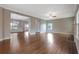 Spacious living room with hardwood floors and ample natural light at 5414 Splendida Ct, Fairburn, GA 30213
